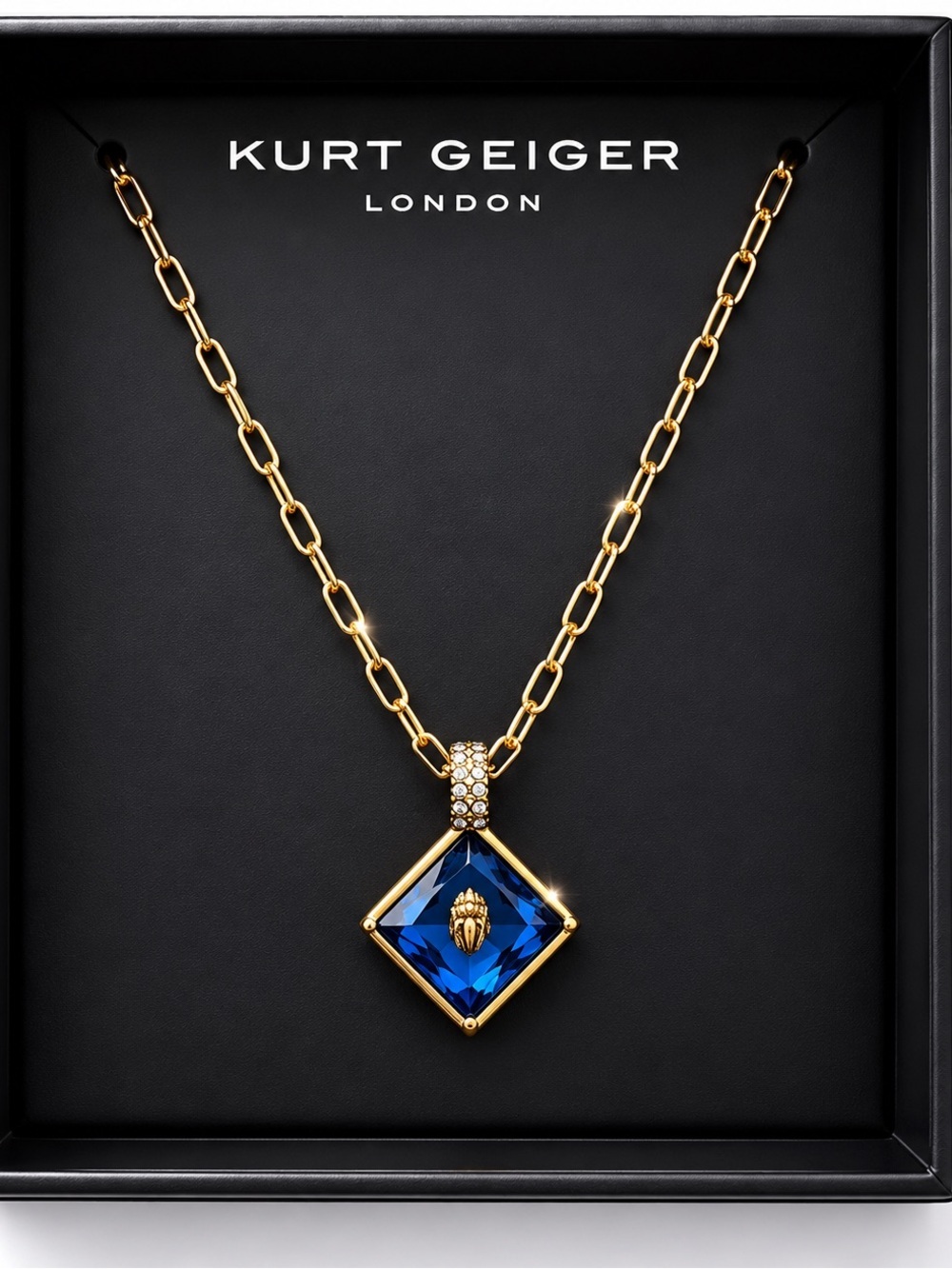 Kurt Geiger Gold Necklace with Blue Crystal Diamond Pendant